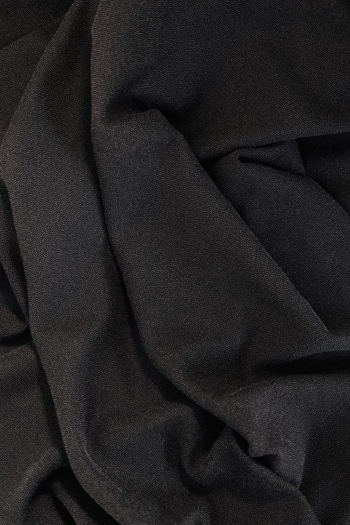 Close-up of heavyweight black cotton fabric
